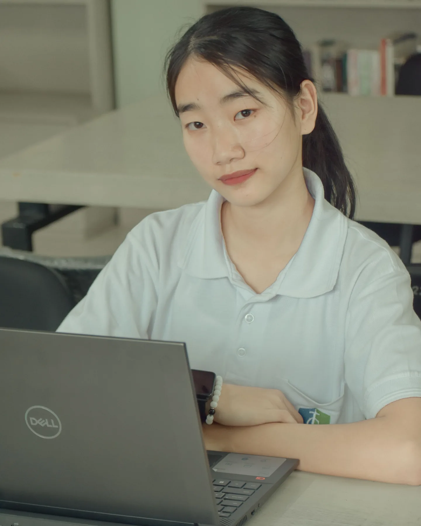 A student studying with a laptop