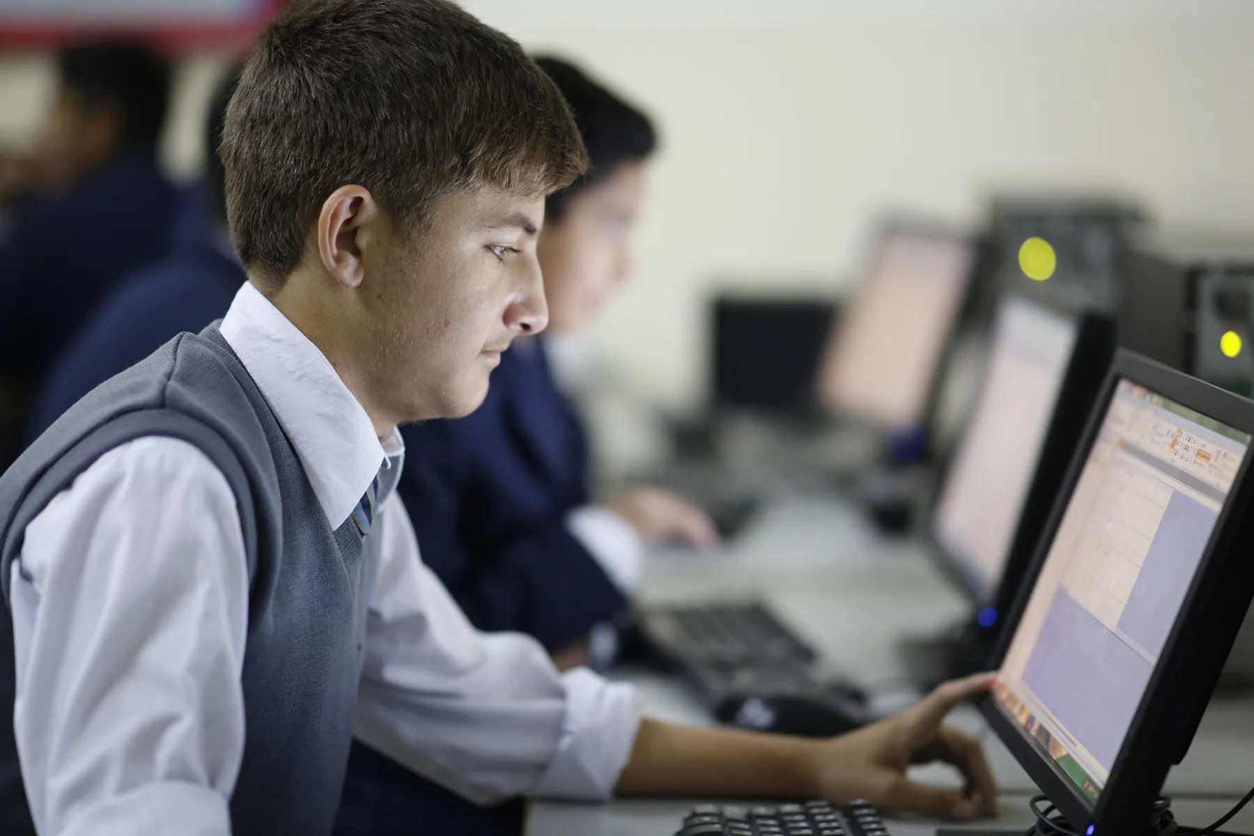 A student using a computer during a class